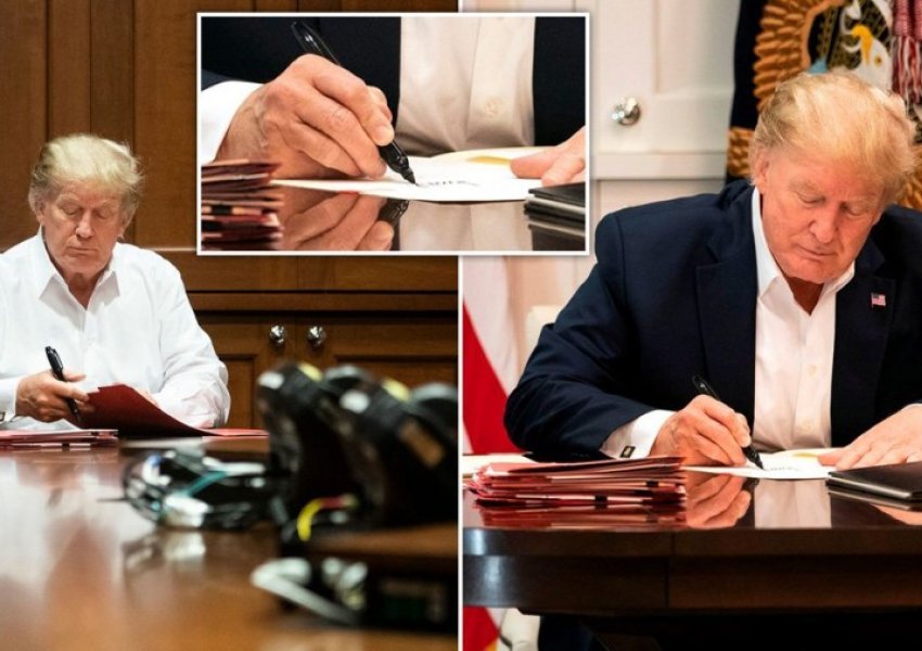 Trump firmosi mbi një fletë të bardhë, për të treguar se ende po punon