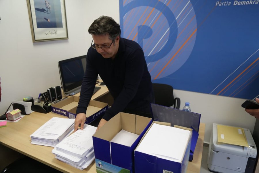 Head of Democrat National Council Paloka shows the 4200 forms signed for the National Assembly  